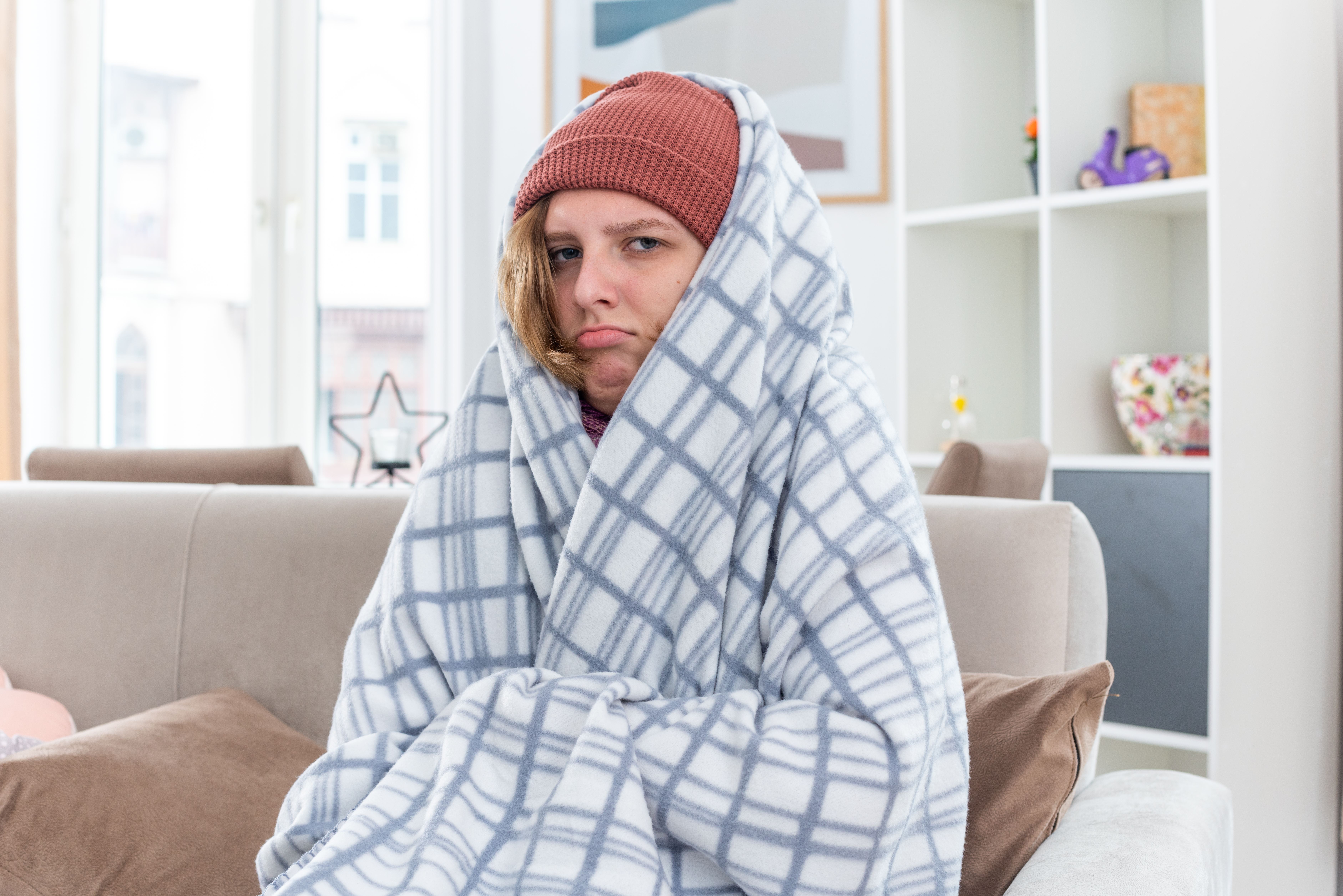 image of a woman wrapped in a blanket